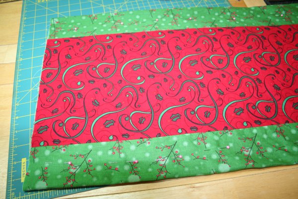 Center feature fabric over second fabric