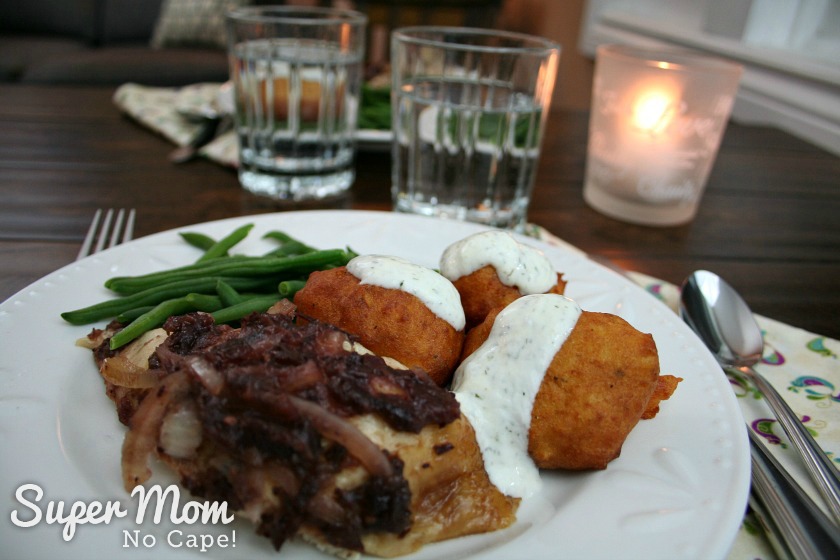 Slow cooker Cranberry Chicken served with potato puffs and green beans