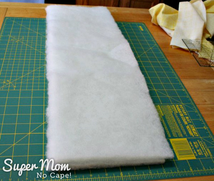 How to Make Bedding for a Doll Cradle - Cut batting to size
