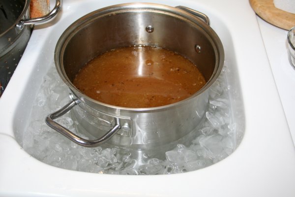 Cool pot of broth in ice water