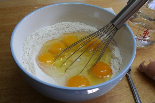 Add eggs to flour