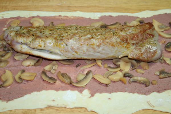 Place browned tenderloin on top of pastry