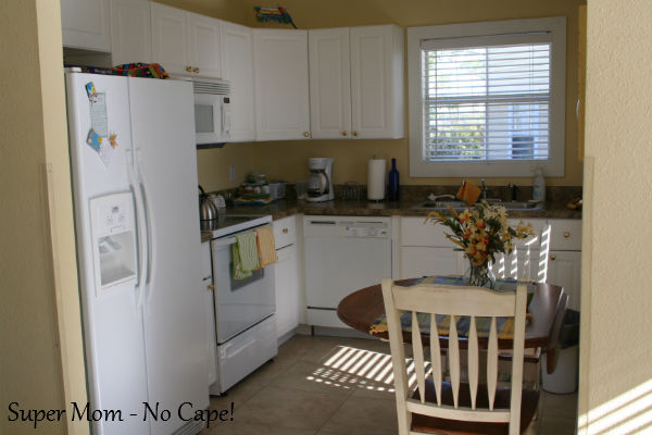 Around the corner from the front door is this cozy little kitchen.