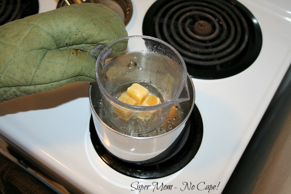 Melt ingredients over boiling water.