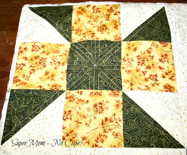 Blocked quilted with an X and a Cross