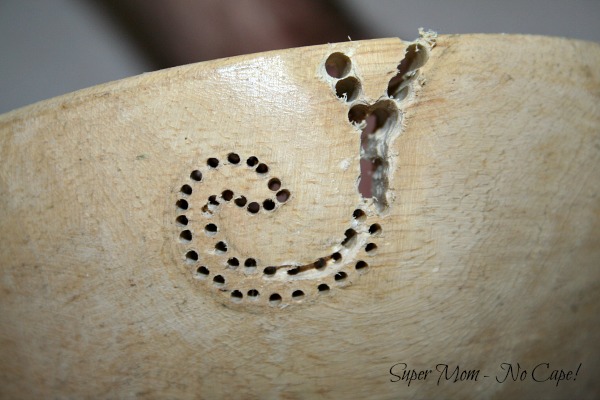 Bowl with small holes drilled inside the outline