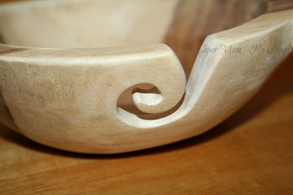 Yarn opening in the side of the bowl with the edges sanded smooth