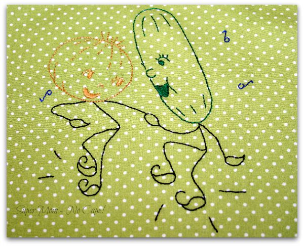 Dancing Onion & Cucumber embroidered on green polka dot fabric