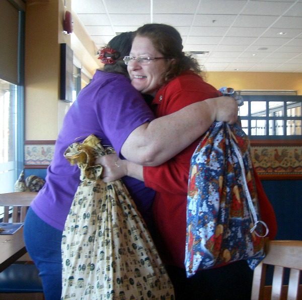 Debbie and I exchanging hugs