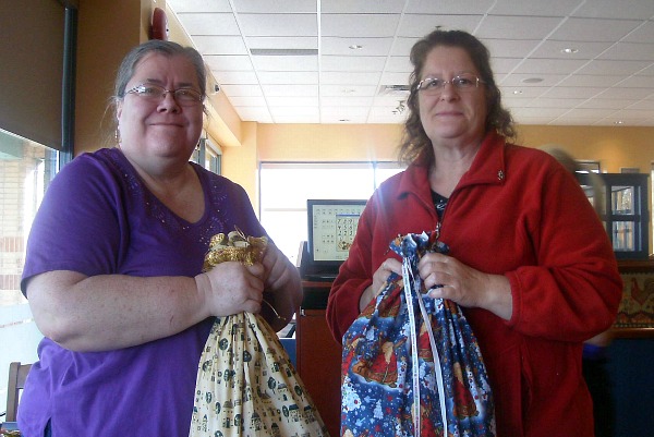 Debbie and I holding the gifts we made for each other
