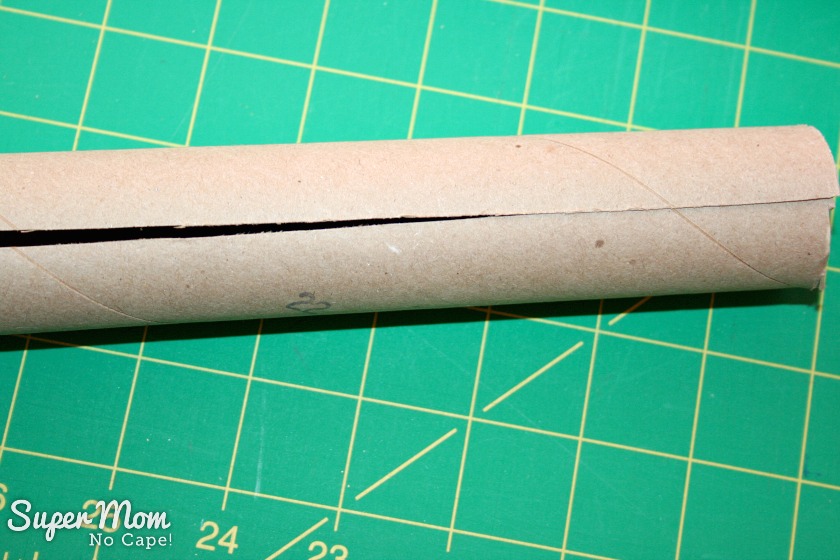 4. Cut a slit along one side of the leftover cardboard tube