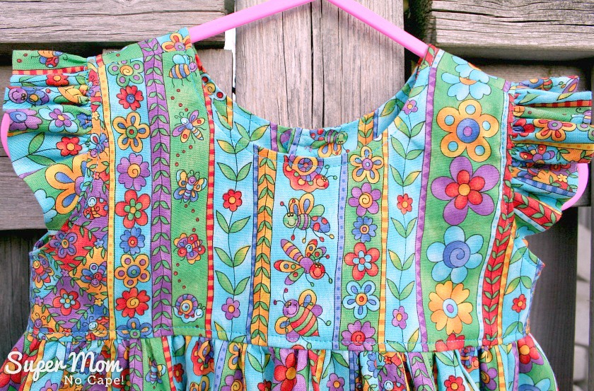 Front of Flutterby Top with Flying Insects down the middle of the bodice