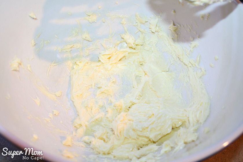 The butter has been creamed in a bowl until light and fluffy.