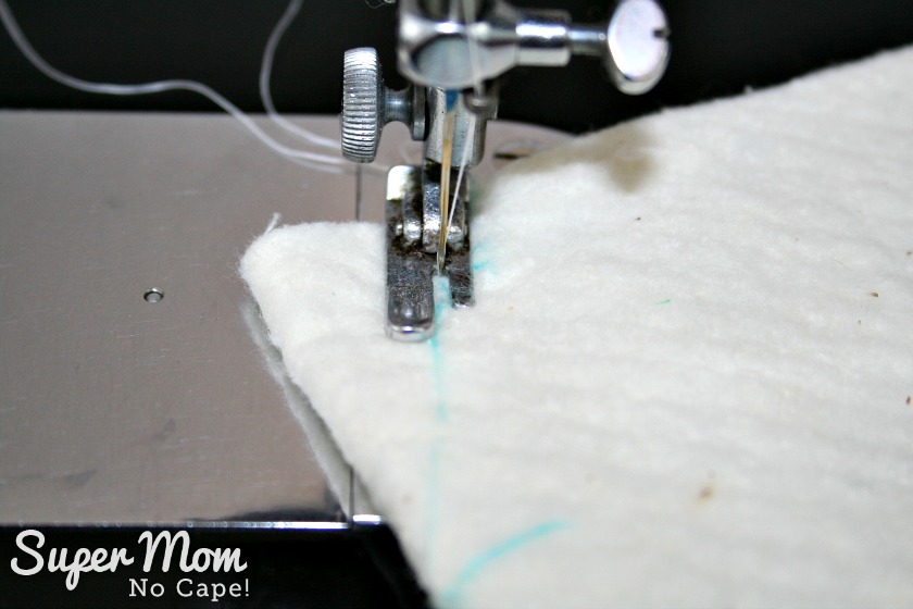 Photo of sewing along the line from one mark to the other.