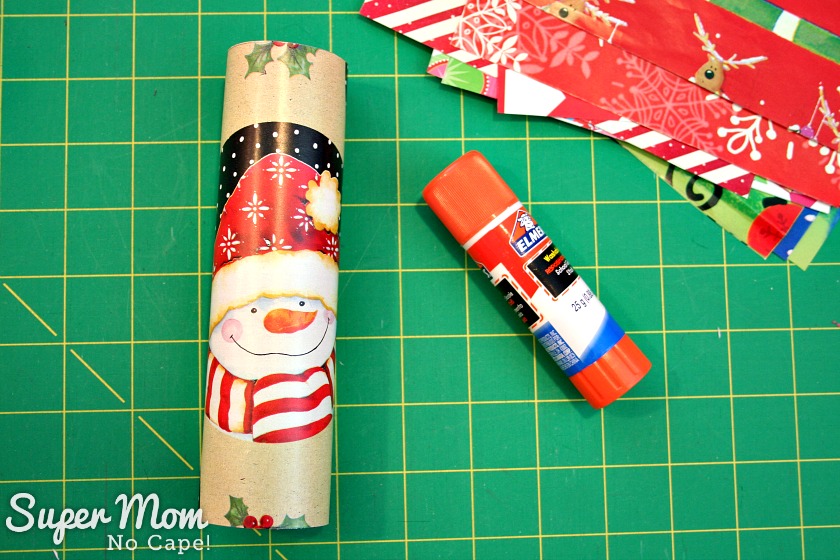Halloween Treat to Christmas Party Favor - Wrap the paper around the toilet paper tube