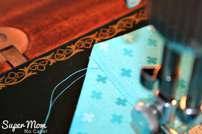 One Hour Table Runner - Photo of starting the topstitching away from the edge, backstitching and then continuing to topstitch