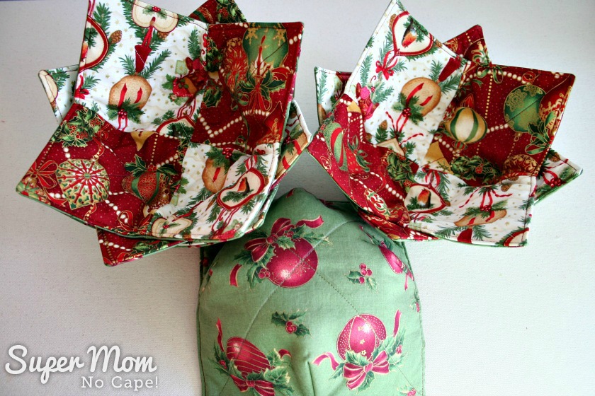 Christmas Charm Square Soup Bowl Cozies - 6 soup bowl cozies showing the coordinating backing fabric