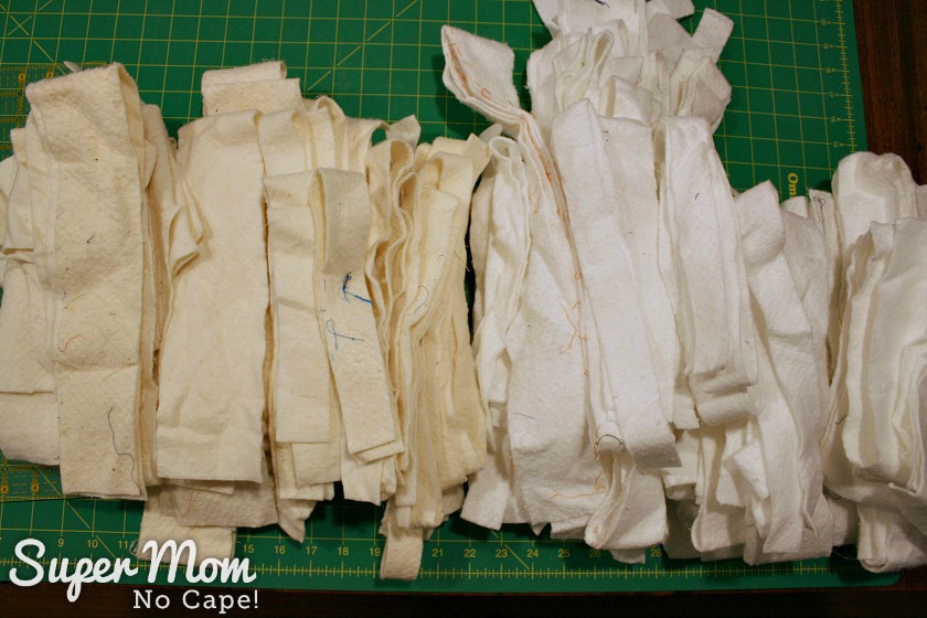 How to Join Leftover Strips of Quilt Batting - 2 Batting strips sorted into white and natural