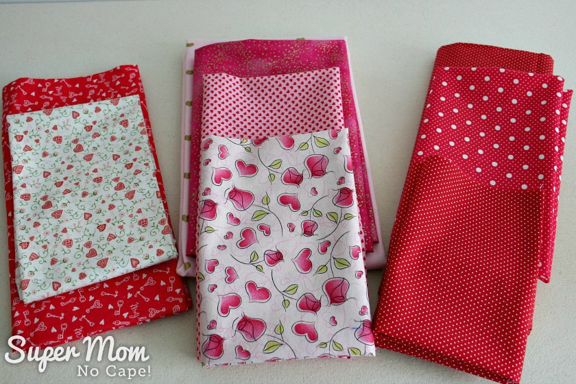 Photo of a variety of fabrics suitable for making the Valentine's Fabric Cones.