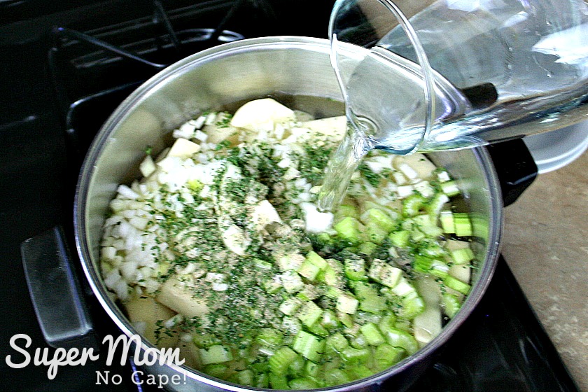 Place the potatoes, onion, celery, parsley and salt into the pot.