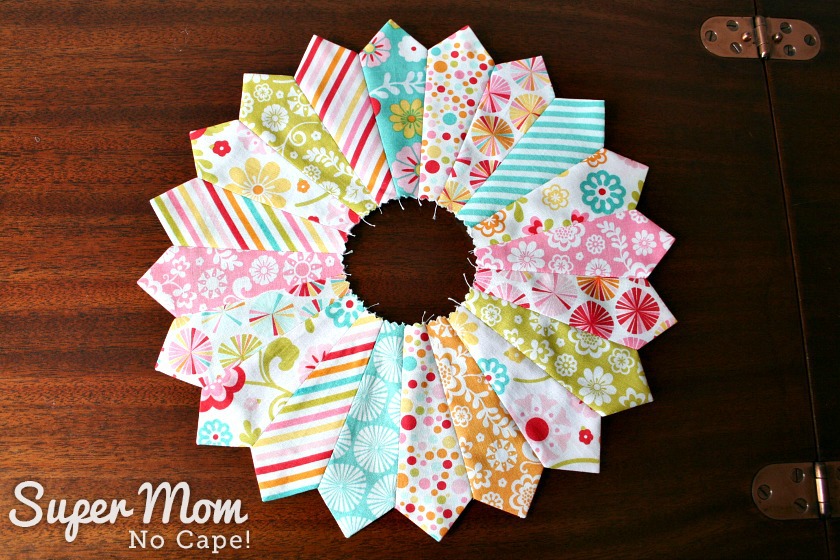 Dresden plate block made from charm squares of Fancy Free by Lori Whitlock