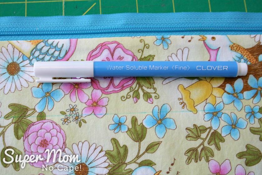 Use a Clover Water Soluble Mark with a fine tip to draw the sewing line