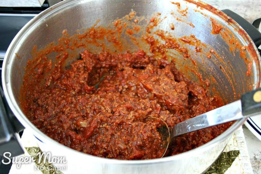 Large pot with meat sauce for lasagna roll ups