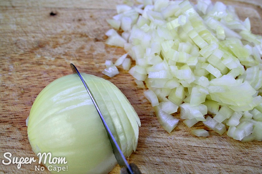 Chopping onions for the Breakfast Burritos