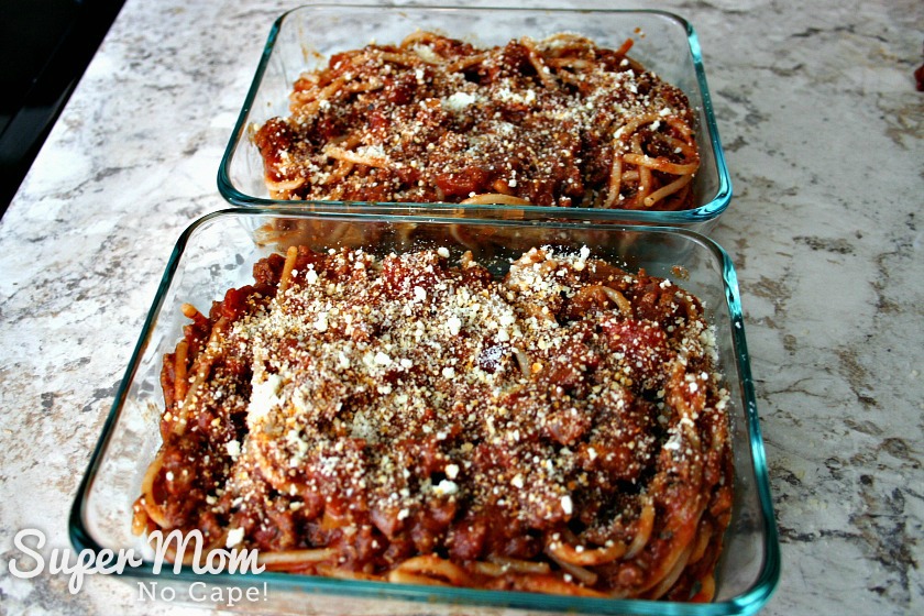 Make these Easy Lasagna Roll Ups for supper tonight or freeze them to have for those nights when life gets a little crazy and you don't have time to cook. Freezer cooking is a sanity saver and this recipe is a family favorite that you'll want to make again and again. #recipes #freezercooking #lasagnarecipes #lasagna #pastarecipes Two freezer dishes of spaghetti and meat sauce