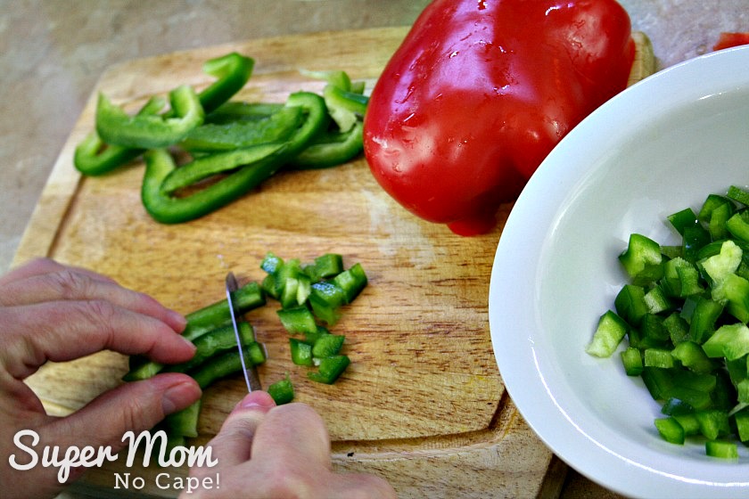 Chopping green peppers for the Breakfast Burritos