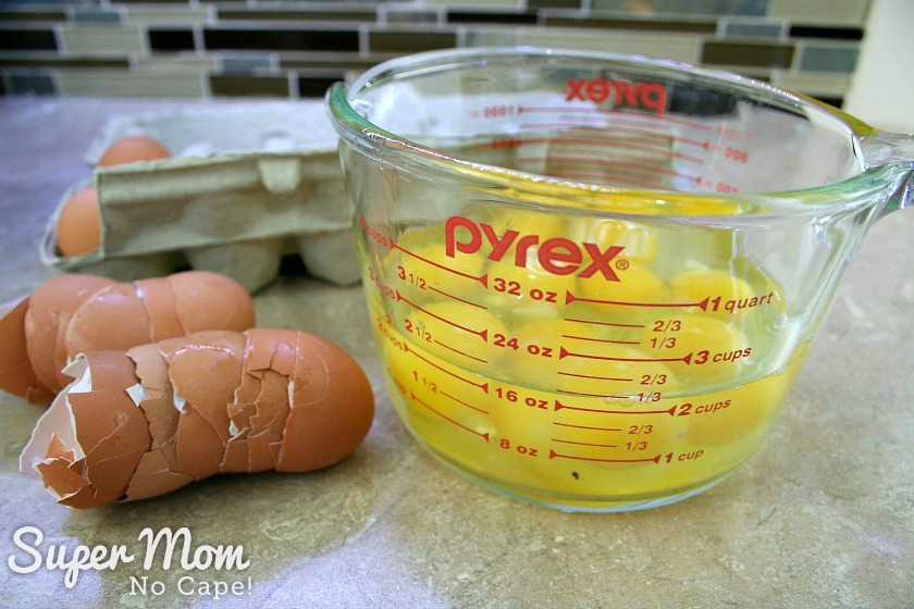 Crack 10 eggs into a large measuring bowl