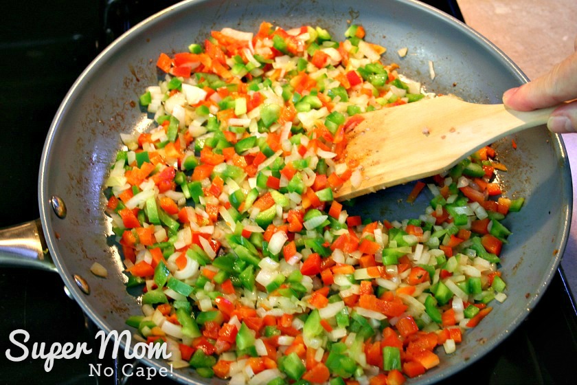 Sauteeing the onions and peppers