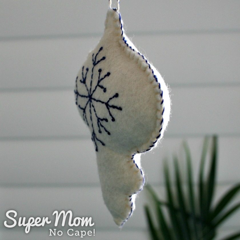 Blue whip stitching on White Felt Bauble with Blue Embroidered Snowflake