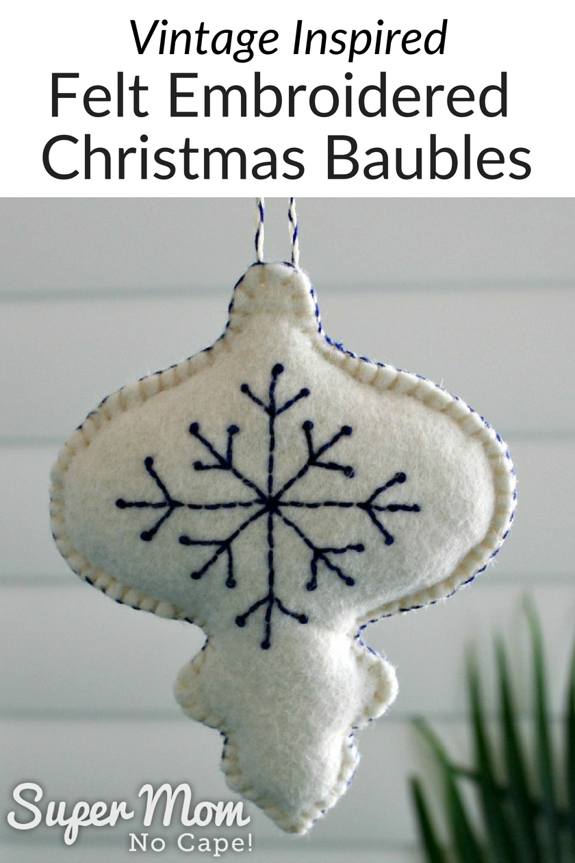 Vintage Inspired Felt Embroidered Christmas Baubles done in white felt and blue floss
