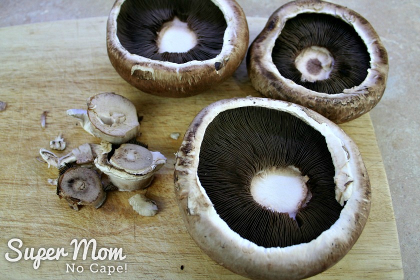  Removing stems from mushrooms for Lamb Stuffed Portobello Mushrooms