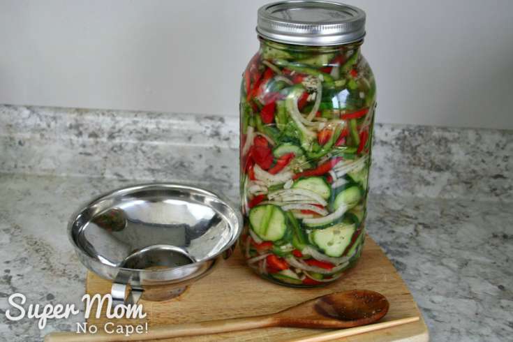 Half gallon jar of Refrigerator Pickles ready to go in fridge