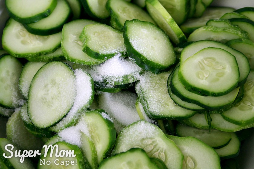 Pickling salt added to sliced cucumbers for Refrigerator Pickles