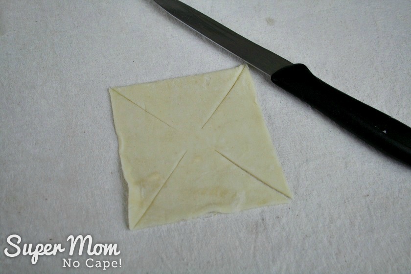 Diagonal slices cut in the puff pastry square