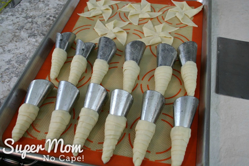 Puff pastry cones and pinwheels ready to go in the oven