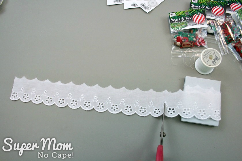 Cutting about 12 inches of eyelet lace for each Christmas Button Lace Ornament