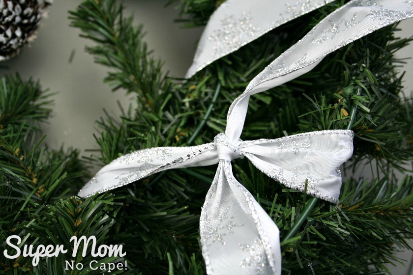 Knot tied in the ribbon on the back of the wreath