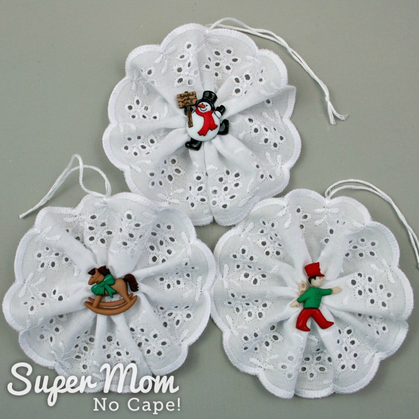Three Christamas Button Lace Ornaments with snowman, rocking horse and toy soldier buttons