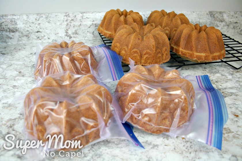 Mini Bundt Cakes in ziplock bags and some on a cooling wrap