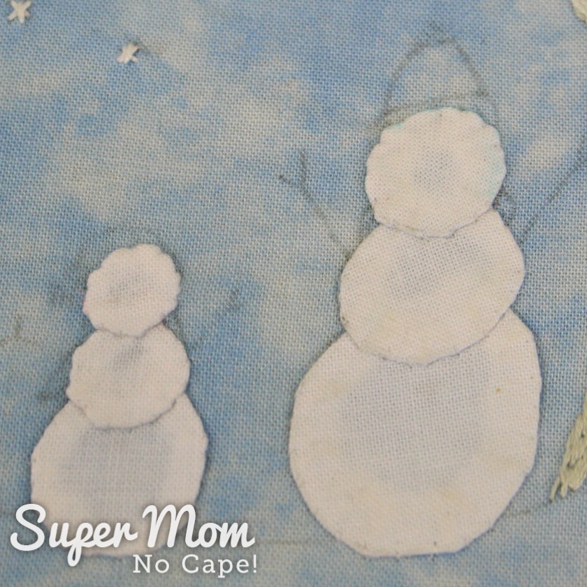 Two needle turn applique snowmen ready to embroider