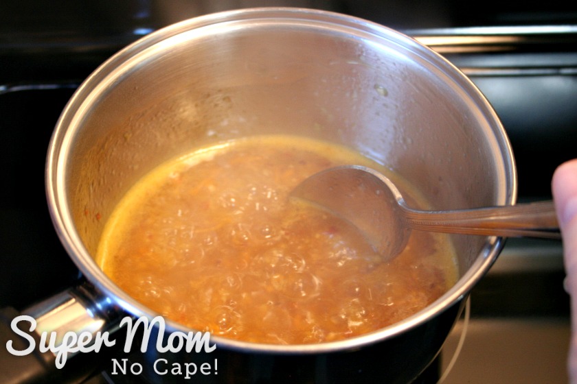 Homemade Orange Sauce that has been brought to a boil