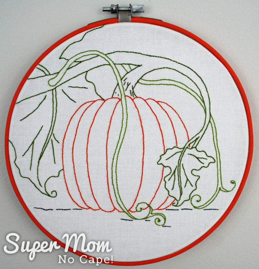 Pumpkin Harvest Embroidery Time Hoop Art framed in an orange painted hoop.