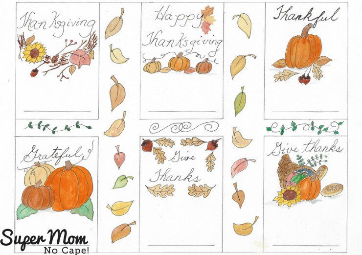 Thanksgiving place cards with pictures of pumpkins, leaves, and acorns