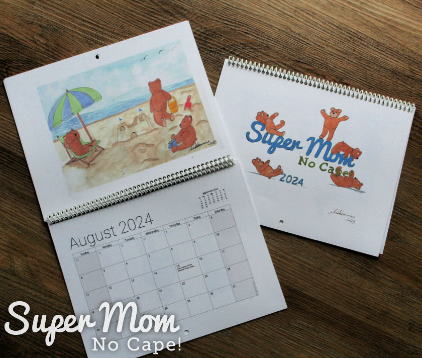 Picture of two of the 2024 Super Mom No Cape Teddy Bear Calendars (August showcased)